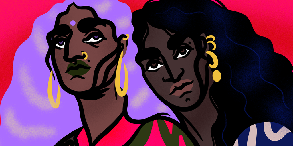 Two women hugging each other